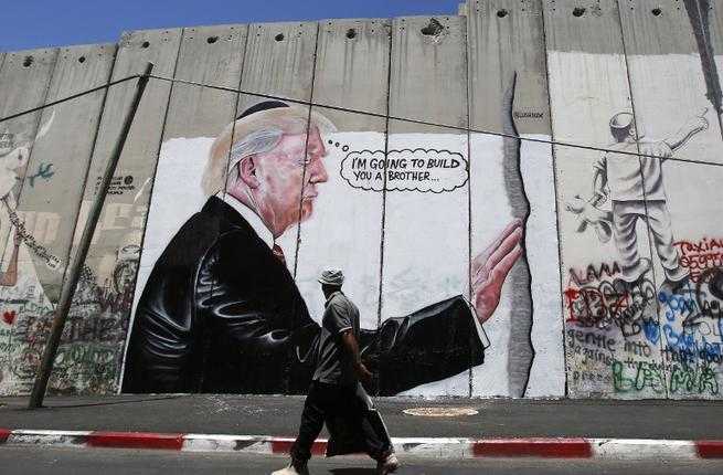 Trump West Bank wall graffiti